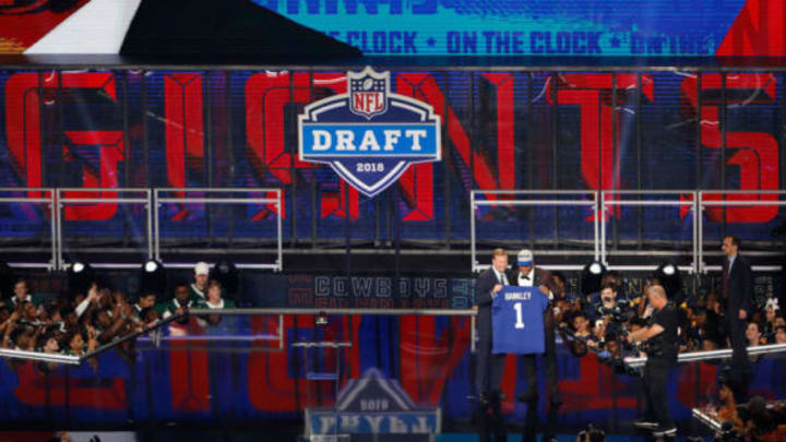 ARLINGTON, TX – APRIL 26: Saquon Barkley of Penn State poses with NFL Commissioner Roger Goodell after being picked #2 overall by the New York Giants during the first round of the 2018 NFL Draft at AT&T Stadium on April 26, 2018 in Arlington, Texas. (Photo by Tim Warner/Getty Images)