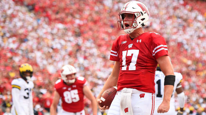 MADISON, WISCONSIN – SEPTEMBER 21: Jack Coan #17 of the Wisconsin Badgers celebrates after scoring a touchdown against the Michigan Wolverines during the first half at Camp Randall Stadium on September 21, 2019 in Madison, Wisconsin. (Photo by Stacy Revere/Getty Images)
