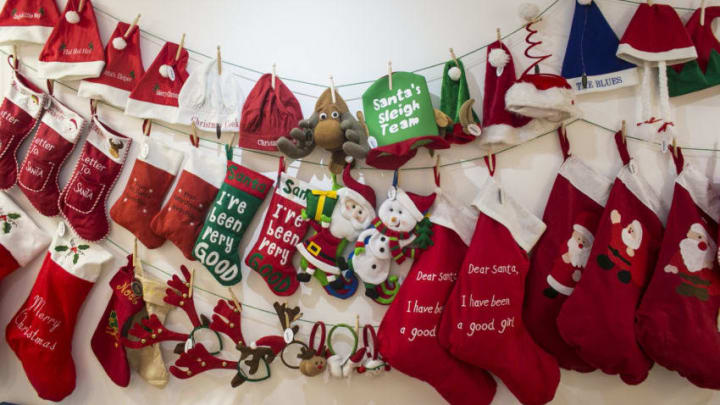 CWMBRAN, WALES - DECEMBER 10: Christmas stockings are displayed in the showroom at the Festive Productions Ltd premises on December 10, 2013 in Cwmbran, Wales. Although Christmas Day 2013 is only two weeks away, the staff at Festive are already planning and gearing up for Christmas 2014. The 14 acre fully integrated showroom, factory and warehouse measuring 250000 sq ft in size holds Festive Productions, who are now the last manufacturer of tinsel in UK - with the majority of tinsel sold in the UK made at the factory in Wales. As well as tinsel, Festive, which is one of Europe's largest suppliers and manufacturer of Christmas and seasonal decorations, has increased its product portfolio, to include nearly every conceivable Christmas decoration category including baubles, tinsel garlands, wreaths, lights, fibre optic trees and artificial trees. (Photo by Matt Cardy/Getty Images)