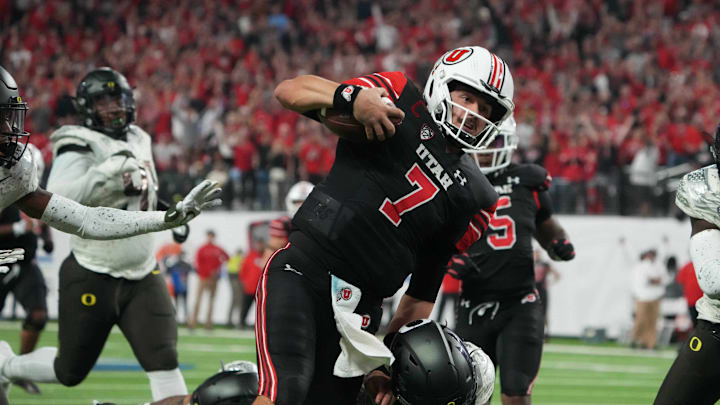 Dec 3, 2021; Las Vegas, NV, USA; Utah Utes quarterback Cameron Rising (7) carries the ball on a 41-yard run against the Oregon Ducks in the third quarter during the 2021 Pac-12 Championship Game at Allegiant Stadium. Mandatory Credit: Kirby Lee-USA TODAY Sports