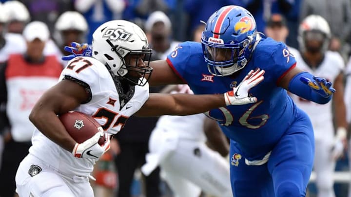 Defensive tackle Daniel Wise #96 of the Kansas Jayhawks (Photo by Ed Zurga/Getty Images)