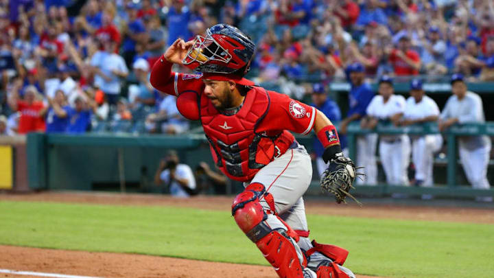 ARLINGTON, TX - AUGUST 17: Rene Rivera #44 of the Los Angeles Angels of Anaheim looks to third base in the second inning against the Texas Rangers at Globe Life Park in Arlington on August 17, 2018 in Arlington, Texas. (Photo by Rick Yeatts/Getty Images)