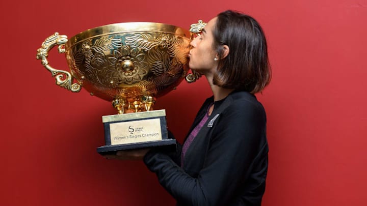 BEIJING, CHINA - OCTOBER 08: Caroline Garcia of France holds the winner's trophy after winning the Women's Singles final against Simona Halep of Romania on day nine of the 2017 China Open at the China National Tennis Centre on October 8, 2017 in Beijing, China. (Photo by Etienne Oliveau/Getty Images)