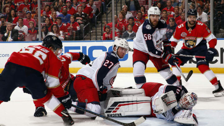 SUNRISE, FL - OCTOBER 11: Goaltender Joonas Korpisalo #70 of the Columbus Blue Jackets defends the net against Denis Malgin #62 of the Florida Panthers at the BB&T Center on October 11, 2018 in Sunrise, Florida. (Photo by Eliot J. Schechter/NHLI via Getty Images)