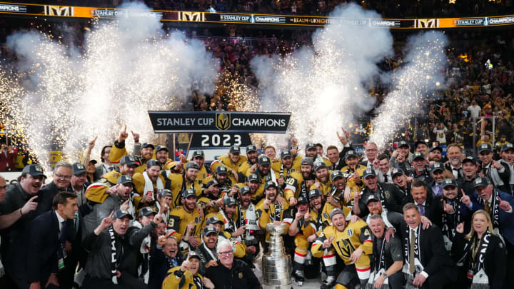Jun 13, 2023; Las Vegas, Nevada, USA; The Vegas Golden Knights pose with the Stanley Cup after defeating the Florida Panthers in game five of the 2023 Stanley Cup Final at T-Mobile Arena. Mandatory Credit: Stephen R. Sylvanie-USA TODAY Sports