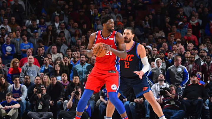 PHILADELPHIA,PA - DECEMBER 15 : Joel Embiid #21 of the Philadelphia 76ers looks to pass the ball against the Oklahoma City Thunder at Wells Fargo Center on December 15, 2017 in Philadelphia, Pennsylvania NOTE TO USER: User expressly acknowledges and agrees that, by downloading and/or using this Photograph, user is consenting to the terms and conditions of the Getty Images License Agreement. Mandatory Copyright Notice: Copyright 2017 NBAE (Photo by Jesse D. Garrabrant/NBAE via Getty Images)