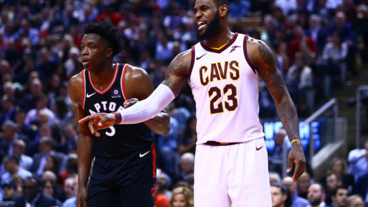 TORONTO, ON - JANUARY 11: Lebron James #23 of the Cleveland Cavaliers and OG Anunoby #3 of the Toronto Raptors wait for a free throw during the second half of an NBA game at Air Canada Centre on January 11, 2018 in Toronto, Canada. NOTE TO USER: User expressly acknowledges and agrees that, by downloading and or using this photograph, User is consenting to the terms and conditions of the Getty Images License Agreement. (Photo by Vaughn Ridley/Getty Images)
