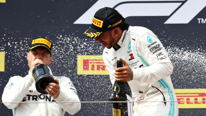 LE CASTELLET, FRANCE - JUNE 23: Race winner Lewis Hamilton of Great Britain and Mercedes GP and second placed Valtteri Bottas of Finland and Mercedes GP celebrate on the podium during the F1 Grand Prix of France at Circuit Paul Ricard on June 23, 2019 in Le Castellet, France. (Photo by Mark Thompson/Getty Images)