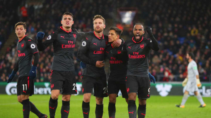 LONDON, ENGLAND - DECEMBER 28: Alexis Sanchez of Arsenal (2R) celebrates as he scores their second goal with Mesut Ozil, Granit Xhaka, Shkodran Mustafi and Alexandre Lacazette during the Premier League match between Crystal Palace and Arsenal at Selhurst Park on December 28, 2017 in London, England. (Photo by Catherine Ivill/Getty Images)