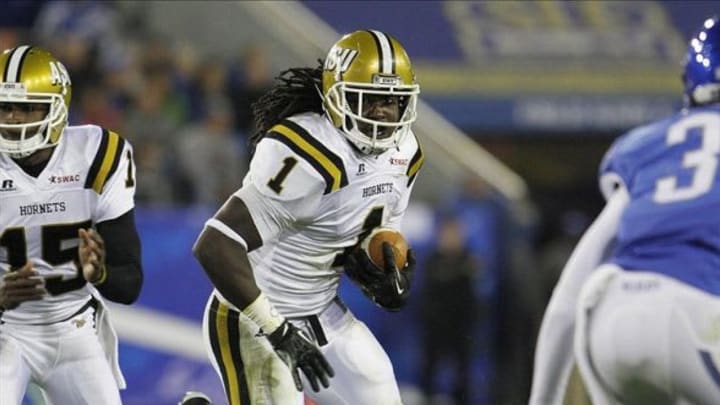 Nov 2, 2013; Lexington, KY, USA; Alabama State Hornets running back Isaiah Crowell (1) runs the ball against the Kentucky Wildcats at Commonwealth Stadium. Mandatory Credit: Mark Zerof-USA TODAY Sports