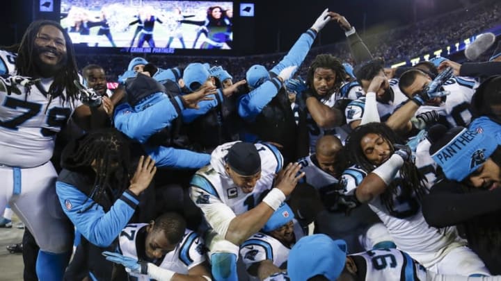 Jan 24, 2016; Charlotte, NC, USA; Carolina Panthers players dab during the fourth quarter against the Arizona Cardinals in the NFC Championship football game at Bank of America Stadium. Mandatory Credit: Jason Getz-USA TODAY Sports