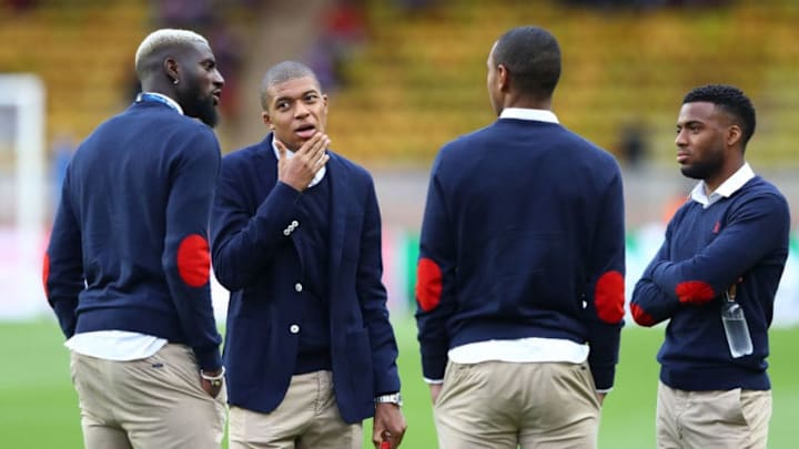 MONACO - MAY 03: Kylian Mbappe of AS Monaco speaks with his team mates as they inspect the pitch prior to the UEFA Champions League Semi Final first leg match between AS Monaco v Juventus at Stade Louis II on May 3, 2017 in Monaco, Monaco. (Photo by Michael Steele/Getty Images)