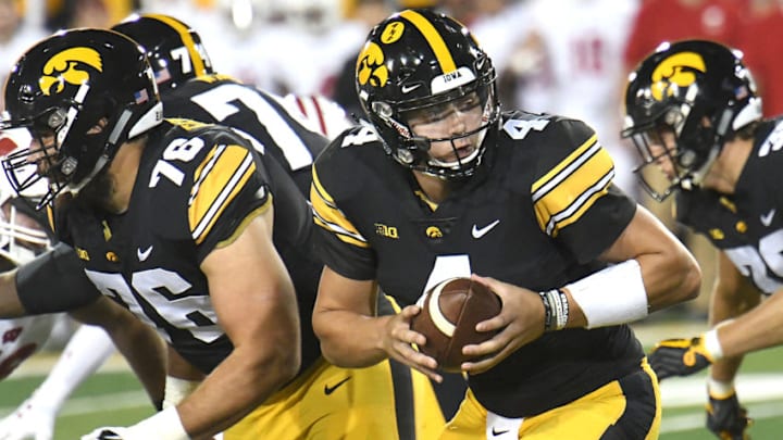 IOWA CITY, IA - SEPTEMBER 22: Iowa Hawkeyes quarterback Nate Stanley (4) gets ready lot hand off the ball during a Big Ten Conference college football game between the Wisconsin Badgers and the Iowa Hawkeyes on September 22, 2018, at Kinnick Stadium, Iowa City, IA. Wisconsin won, 28-17. (Photo by Keith Gillett/Icon Sportswire via Getty Images)