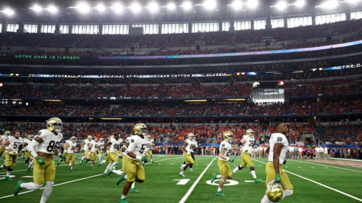 ARLINGTON, TEXAS - DECEMBER 29: The Notre Dame Fighting Irish take the field for warm ups before the game against the Clemson Tigers during the College Football Playoff Semifinal Goodyear Cotton Bowl Classic at AT&T Stadium on December 29, 2018 in Arlington, Texas. (Photo by Ronald Martinez/Getty Images)
