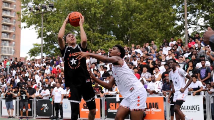 NEW YORK, NY - AUGUST 18: RJ Hampton #5 of Team Ramsey heads for the net as Josh Christopher #3 of Team Stanley defends during the SLAM Summer Classic 2018 at Dyckman Park on August 18, 2018 in New York City. (Photo by Elsa/Getty Images)