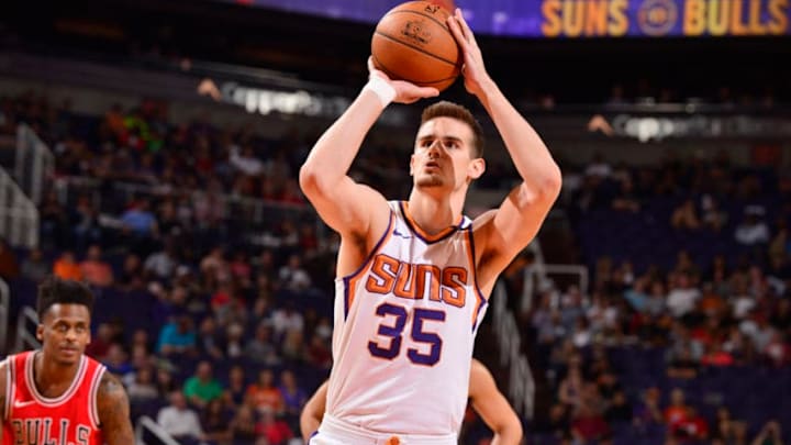 PHOENIX, AZ - NOVEMBER 19: Dragan Bender #35 of the Phoenix Suns shoots a free throw against the Chicago Bulls on November 19, 2017 at Talking Stick Resort Arena in Phoenix, Arizona. NOTE TO USER: User expressly acknowledges and agrees that, by downloading and or using this photograph, user is consenting to the terms and conditions of the Getty Images License Agreement. Mandatory Copyright Notice: Copyright 2017 NBAE (Photo by Barry Gossage/NBAE via Getty Images)