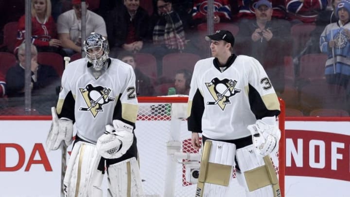 Jan 9, 2016; Montreal, Quebec, CAN; Pittsburgh Penguins goalie Marc-Andre Fleury (29) and teammate Jeff Zatkoff (37) skate off the ice after defeating the Montreal Canadiens 3-1 at the Bell Centre. Mandatory Credit: Eric Bolte-USA TODAY Sports