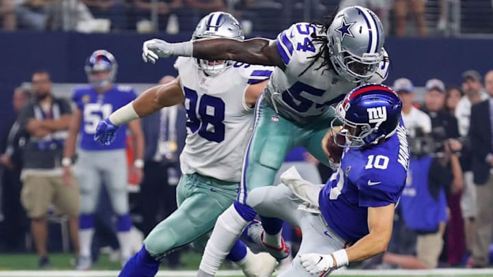 ARLINGTON, TX - SEPTEMBER 16: Jaylon Smith #54 of the Dallas Cowboys hits Eli Manning #10 of the New York Giants in the third quarter at AT&T Stadium on September 16, 2018 in Arlington, Texas. (Photo by Tom Pennington/Getty Images)