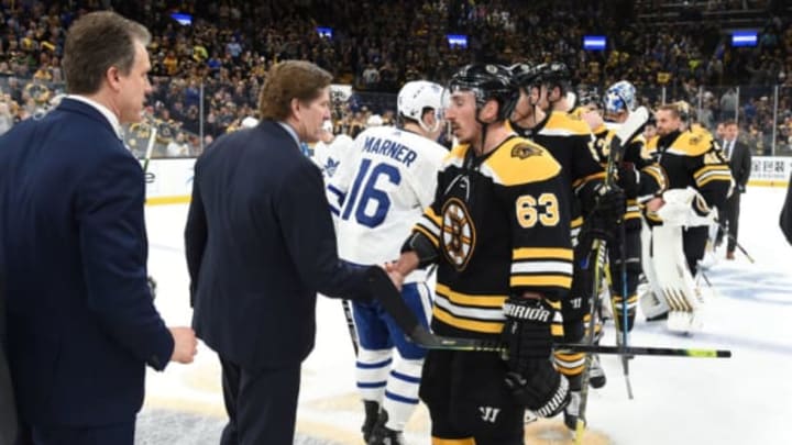 BOSTON, MA – APRIL 23: Brad Marchand #63 of the Boston Bruins shakes hands with Head Coach Mike Babcock of the Toronto Maple Leafs after Game Seven of the Eastern Conference First Round during the 2019 NHL Stanley Cup Playoffs at the TD Garden on April 23, 2019 in Boston, Massachusetts. (Photo by Steve Babineau/NHLI via Getty Images)