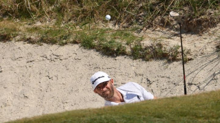 KIAWAH ISLAND, SOUTH CAROLINA - MAY 21: Dustin Johnson of the United States plays a shot from the sand on the ninth hole during the second round of the 2021 PGA Championship at Kiawah Island Resort's Ocean Course on May 21, 2021 in Kiawah Island, South Carolina. (Photo by Jamie Squire/Getty Images)