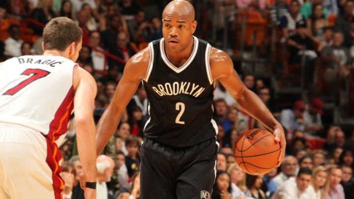 MIAMI, FL - DECEMBER 28: Jarrett Jack #2 of the Brooklyn Nets defends the ball against the Miami Heat during the game on December 28, 2015 at American Airlines Arena in Miami, Florida. Copyright 2015 NBAE (Photo by Oscar Baldizon/NBAE via Getty Images)
