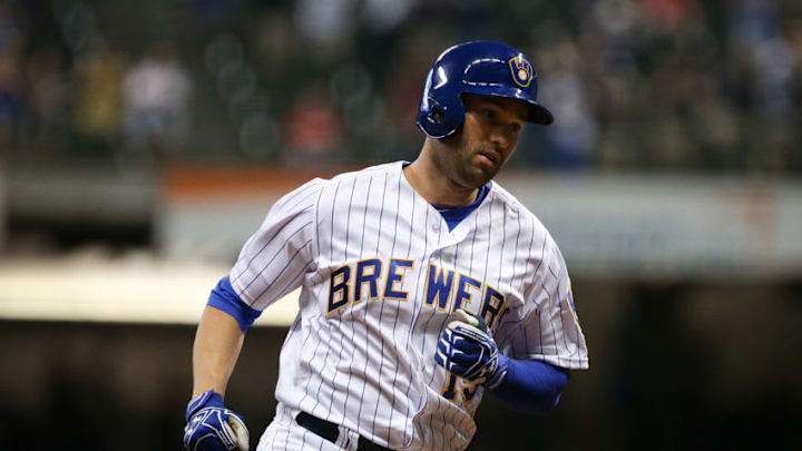 MILWAUKEE, WI - SEPTEMBER 15: Neil Walker #15 of the Milwaukee Brewers rounds the bases after hitting a grand slam in the eighth inning against the Miami Marlins at Miller Park on September 15, 2017 in Milwaukee, Wisconsin. (Photo by Dylan Buell/Getty Images)