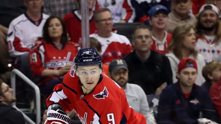 WASHINGTON, DC – APRIL 13: Dmitry Orlov #9 of the Washington Capitals skates with puck against the Carolina Hurricanes in Game Two of the Eastern Conference First Round during the 2019 NHL Stanley Cup Playoffs at Capital One Arena on April 13, 2019 in Washington, DC. (Photo by Rob Carr/Getty Images)