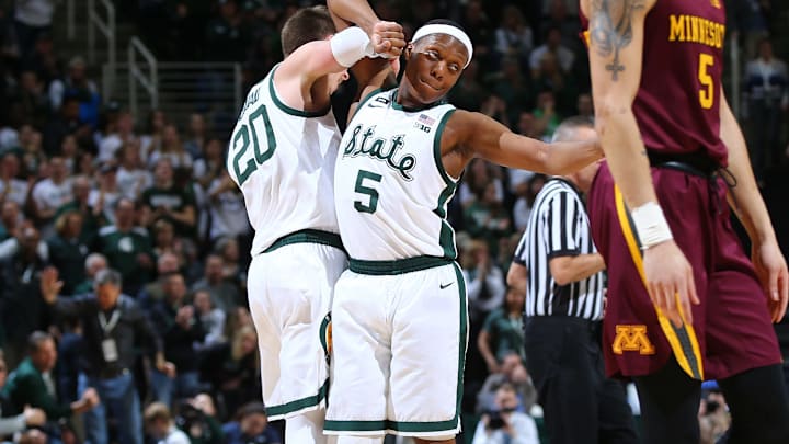 EAST LANSING, MI – FEBRUARY 09: Matt McQuaid #20 of the Michigan State Spartans celebrates his made basket with Cassius Winston #5 of the Michigan State Spartans in the second half at Breslin Center on February 9, 2019 in East Lansing, Michigan. (Photo by Rey Del Rio/Getty Images)