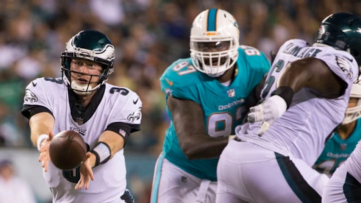 PHILADELPHIA, PA - AUGUST 24: Matt McGloin #3 of the Philadelphia Eagles tosses the ball against Jordan Phillips #97 of the Miami Dolphins in the second quarter in the preseason game at Lincoln Financial Field on August 24, 2017 in Philadelphia, Pennsylvania. The Eagles defeated the Dolphins 38-31. (Photo by Mitchell Leff/Getty Images)
