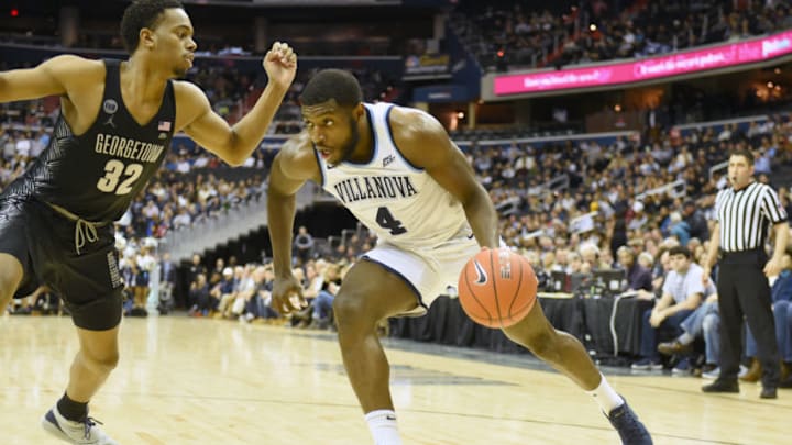 WASHINGTON, DC - FEBRUARY 20: Eric Paschall #4 of the Villanova Wildcats dribbles the ball during a college basketball game against the Georgetown Hoyas at the Capital One Arena on February 20, 2019 in Washington, DC. (Photo by Mitchell Layton/Getty Images)