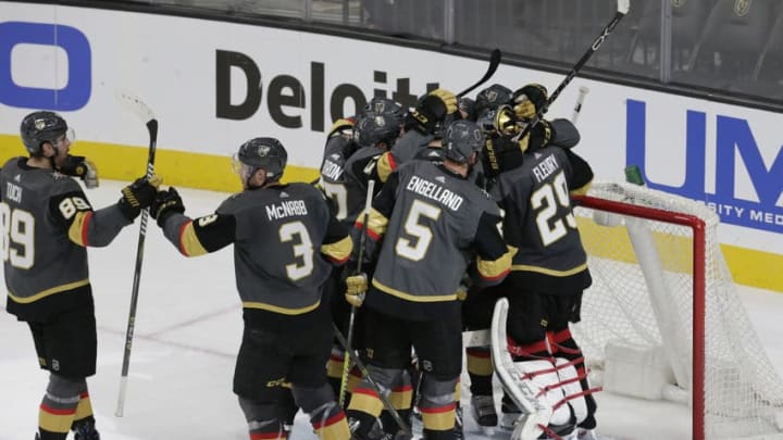 LAS VEGAS, NV - DECEMBER 23: Vegas Golden Knights players celebrate after winning a regular season game against the Washington Capitals at T-Mobile Arena on Saturday, Dec. 23, 2017, in Las Vegas. The Vegas Golden Knights would defeat the Washington Capitals 3-0. (Photo by: Marc Sanchez/Icon Sportswire via Getty Images)