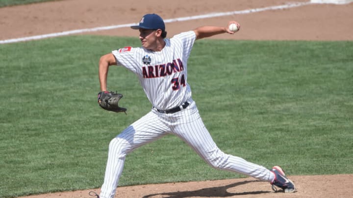 Jun 21, 2021; Omaha, Nebraska, USA; Arizona Wildcats pitcher Ian Churchill (34) pitches in the seventh inning against the Stanford Cardinal at TD Ameritrade Park. Mandatory Credit: Steven Branscombe-USA TODAY Sports