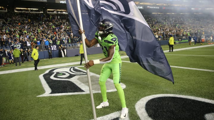 SEATTLE, WASHINGTON – OCTOBER 03: Tre Flowers #21 of the Seattle Seahawks celebrates on the field after the Seattle Seahawks defeated the Los Angeles Rams 30-29 during their game at CenturyLink Field on October 03, 2019 in Seattle, Washington. (Photo by Abbie Parr/Getty Images)