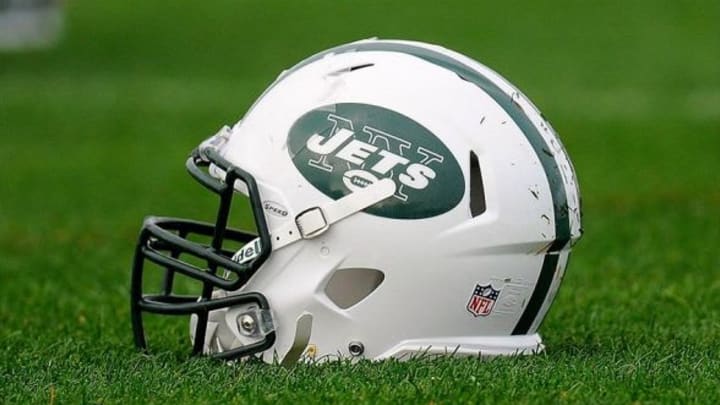 July 29, 2012; Cortland, NY, USA; A general view of a New York Jets helmet on the ground during training camp at SUNY Cortland. Mandatory Credit: Rich Barnes-USA TODAY Sports