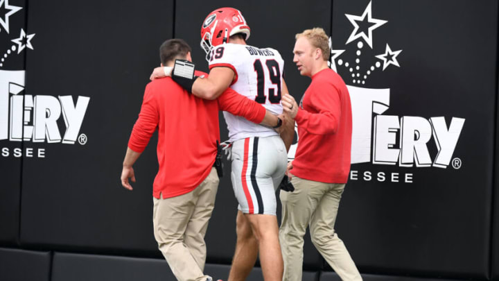 Oct 14, 2023; Nashville, Tennessee, USA; Georgia Bulldogs tight end Brock Bowers (19) walks off the field after an injury during the first half against the Vanderbilt Commodores at FirstBank Stadium. Mandatory Credit: Christopher Hanewinckel-USA TODAY Sports