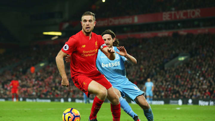 LIVERPOOL, ENGLAND - DECEMBER 27: Jordan Henderson of Liverpool holds off Joe Allen of Stoke City during the Premier League match between Liverpool and Stoke City at Anfield on December 27, 2016 in Liverpool, England. (Photo by Alex Livesey/Getty Images)