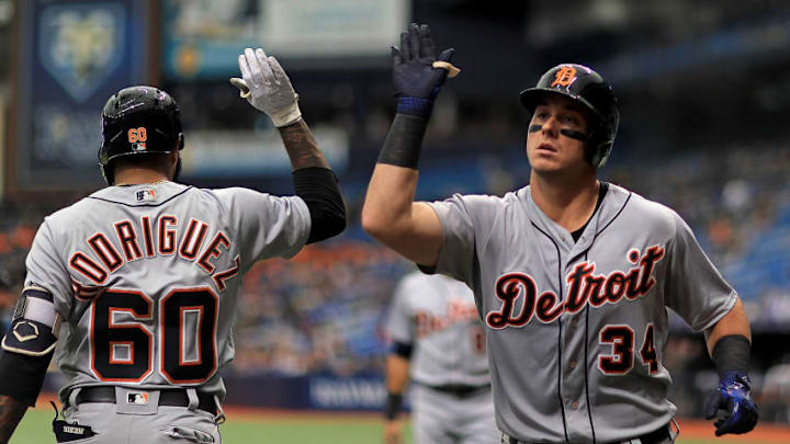 ST PETERSBURG, FL - JULY 11: James McCann #34 of the Detroit Tigers is congratulated after hitting a two run home run in the fourth inning during a game against the Tampa Bay Rays at Tropicana Field on July 11, 2018 in St Petersburg, Florida. (Photo by Mike Ehrmann/Getty Images)