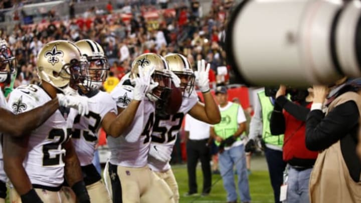TAMPA, FL – DECEMBER 31: The New Orleans Saints pose for a team photo as they celebrate an interception in the end zone by free safety Marcus Williams #43 of the New Orleans Saints during the third quarter of an NFL football game against the Tampa Bay Buccaneers on December 31, 2017 at Raymond James Stadium in Tampa, Florida. (Photo by Brian Blanco/Getty Images)