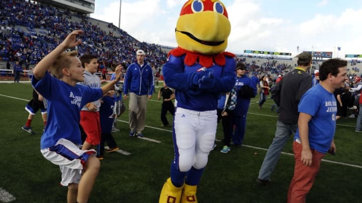 Kansas Jayhawks fans celebrate after the win at Memorial Stadium. - Credit: John Rieger-USA TODAY Sports