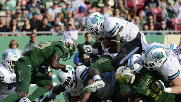 TAMPA, FLORIDA - NOVEMBER 03: Corey Dauphine #6 of the Tulane Green Wave runs in a touchdown during the second quarter against the South Florida Bulls at Raymond James Stadium on November 03, 2018 in Tampa, Florida. (Photo by Julio Aguilar/Getty Images)