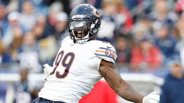 Oct 26, 2014; Foxborough, MA, USA; Chicago Bears defensive end Lamarr Houston (99) celebrates after sacking New England Patriots quarterback Jimmy Garoppolo (not pictured) during the fourth quarter at Gillette Stadium. The Patriots won 51-23. Mandatory Credit: Greg M. Cooper-USA TODAY Sports