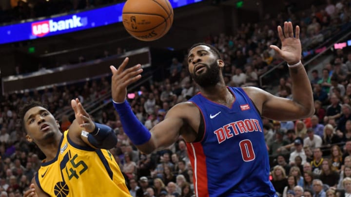 SALT LAKE CITY, UT - MARCH 13: Donovan Mitchell #45 of the Utah Jazz and Andre Drummond #0 of the Detroit Pistons try for the loose ball in the second half of a game at Vivint Smart Home Arena on March 13, 2018 in Salt Lake City, Utah. The Utah Jazz beat the Detroit Pistons 110-79. NOTE TO USER: User expressly acknowledges and agrees that, by downloading and or using this photograph, User is consenting to the terms and conditions of the Getty Images License Agreement. (Photo by Gene Sweeney Jr./Getty Images)