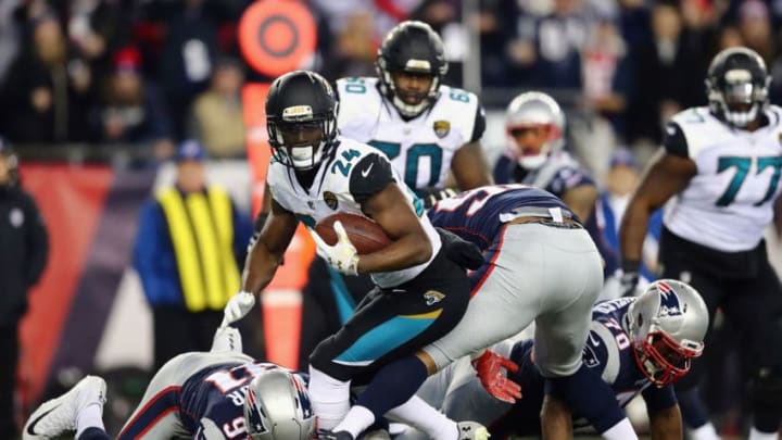FOXBOROUGH, MA - JANUARY 21: T.J. Yeldon #24 of the Jacksonville Jaguars carries the ball in the third quarter during the AFC Championship Game against the New England Patriots at Gillette Stadium on January 21, 2018 in Foxborough, Massachusetts. (Photo by Adam Glanzman/Getty Images)