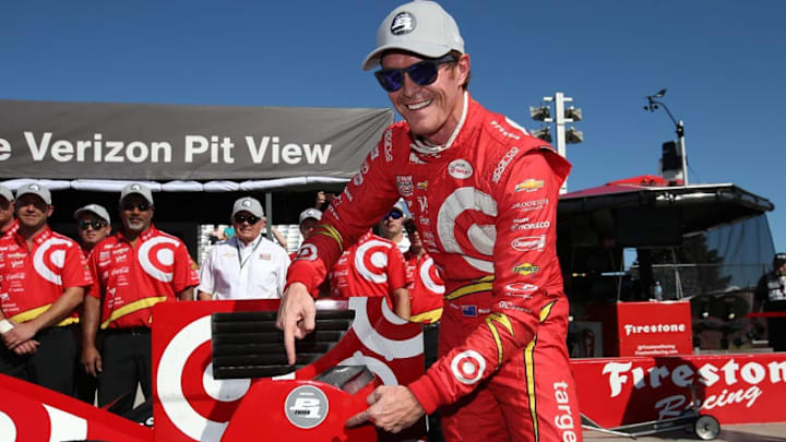 Scott Dixon poses with his Verizon P1 Award sticker after winning the pole for the 2016 Grand Prix at the Glen. Photo Credit: Chris Jones/Courtesy of IndyCar