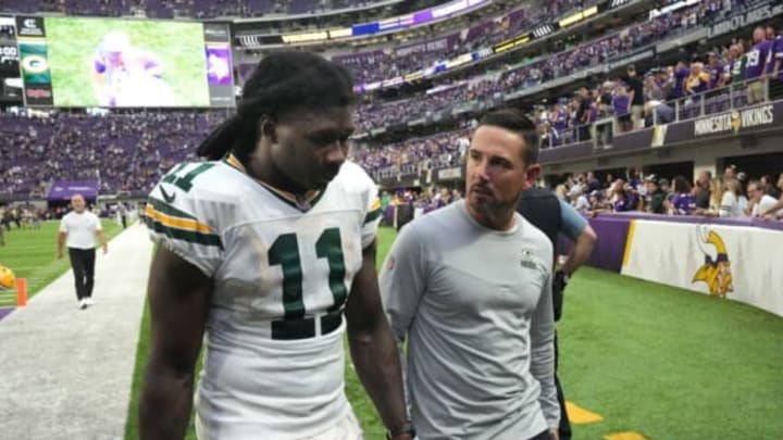 Green Bay Packers head coach Matt LaFleur walks off the field with wide receiver Sammy Watkins (11) after their game Sunday, September 11, 2022 at U.S. Bank Stadium in Minneapolis, Minn. The Minnesota Vikings beat the Green Bay Packers 23-7.Packers11 7