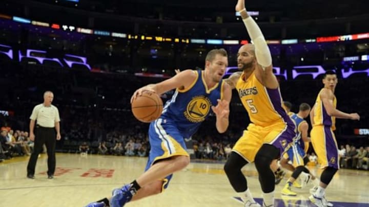 Oct 9, 2014; Los Angeles, CA, USA; Golden State Warriors guard Leandro Barbosa (10) drives against Los Angeles Lakers forward Carlos Boozer (5) during the first half at Staples Center. Mandatory Credit: Richard Mackson-USA TODAY Sports Oct 9, 2014; Los Angeles, CA, USA; Golden State Warriors guard Leandro Barbosa (10) drives against Los Angeles Lakers forward Carlos Boozer (5) during the first half at Staples Center. Mandatory Credit: Richard Mackson-USA TODAY Sports