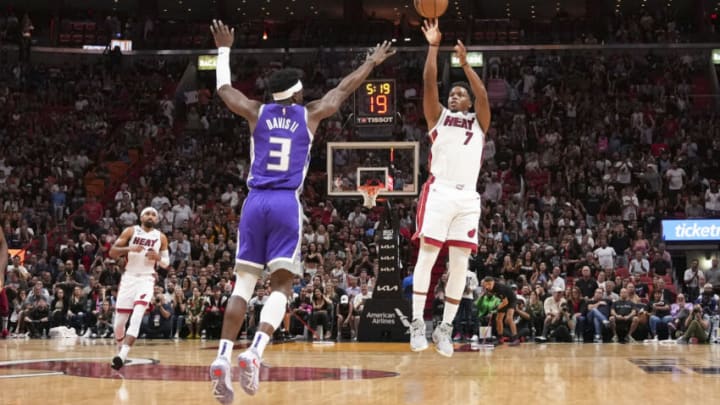 Kyle Lowry #7 of the Miami Heat shoots a three-point shot over Terence Davis #3 of the Sacramento Kings(Photo by Eric Espada/Getty Images)
