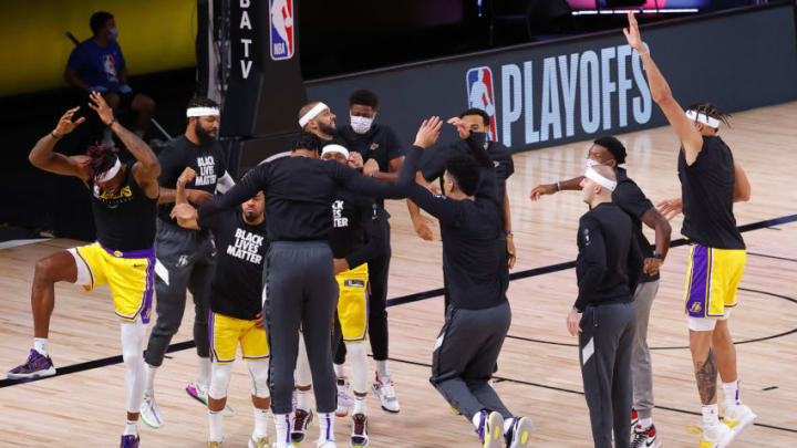 LAKE BUENA VISTA, FLORIDA - AUGUST 20: The Los Angeles Lakers warm up prior to the start of the game against the Portland Trail Blazers in Game Two of the Western Conference First Round during the 2020 NBA Playoffs at AdventHealth Arena at ESPN Wide World Of Sports Complex on August 20, 2020 in Lake Buena Vista, Florida. NOTE TO USER: User expressly acknowledges and agrees that, by downloading and or using this photograph, User is consenting to the terms and conditions of the Getty Images License Agreement. (Photo by Kevin C. Cox/Getty Images)