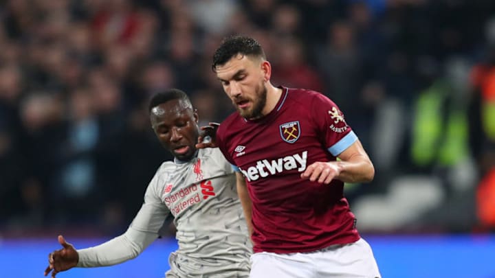 LONDON, ENGLAND - FEBRUARY 04: Naby Keita of Liverpool battles for possession with Robert Snodgrass of West Ham United during the Premier League match between West Ham United and Liverpool FC at London Stadium on February 04, 2019 in London, United Kingdom. (Photo by Catherine Ivill/Getty Images)