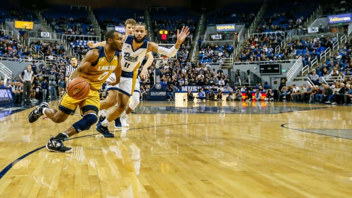 RENO, NEVADA – NOVEMBER 19: Milan Acquaah #0 of the California Baptist Lancers drives to the basket durign the second half against the Nevada Wolf Pack at Lawlor Events Center on November 19, 2018 in Reno, Nevada. (Photo by Jonathan Devich/Getty Images)